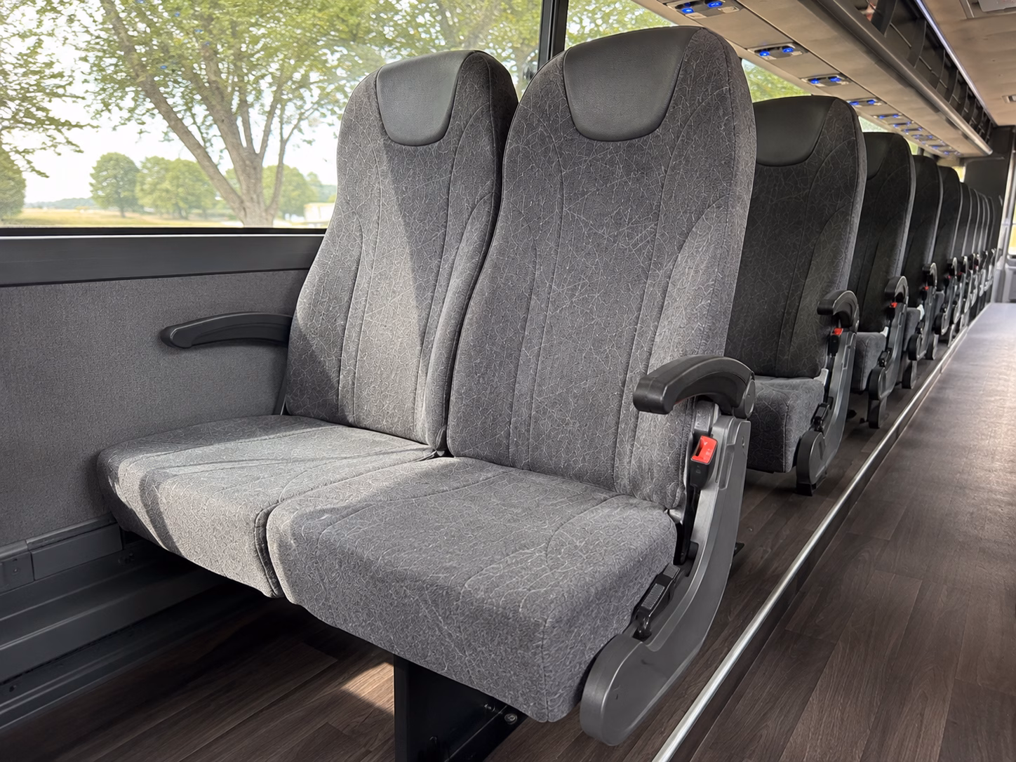 how the type of bus you choose changes the price in lansing michigan
